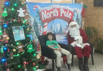 John Geigle YMCA member with Santa!