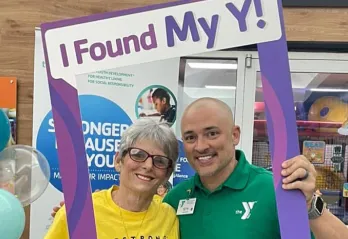 Seth Milbrand with a LiveStrong participant.