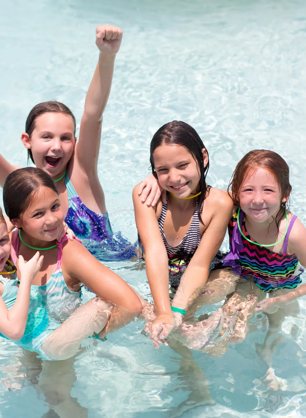 summer campers in pool