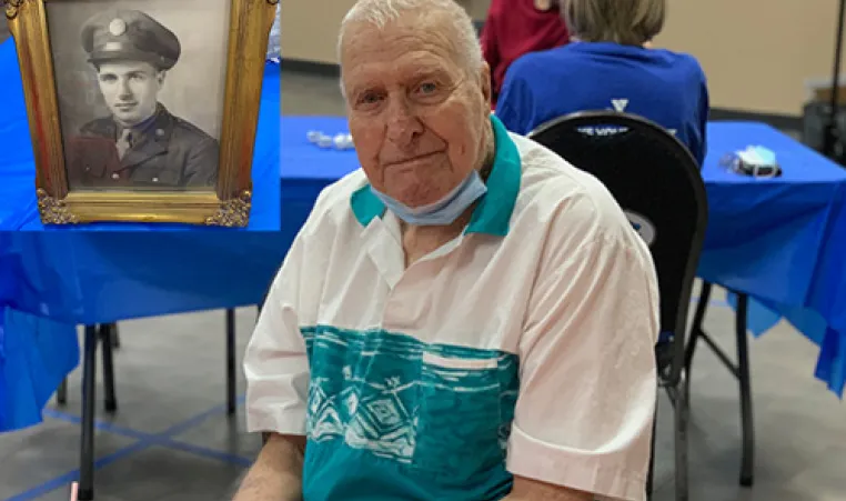 101 year old veteran smiling at birthday celebration at the Y