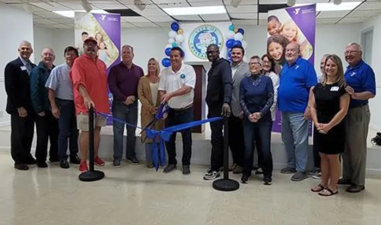 YMCA of the Suncoast staff and City of Crystal River representatives cut the ribbon at the official opening of the Crystal River YMCA Community Engagement Center.