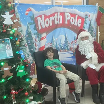 John Geigle YMCA member with Santa!
