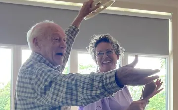 Lewis on his tambourine with Janie 