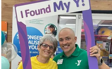 Seth Milbrand with a LiveStrong participant.